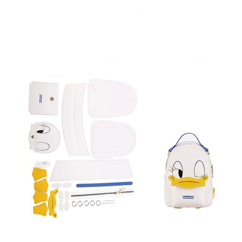 White Donald Duck DIY bag kit with stitching tools and leather pieces